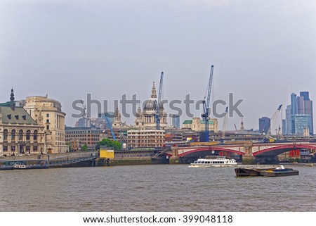 St Paul Cathedral and Blackfriars Bridge on Northern Bank of River Thames in London, UK. Saint Paul Cathedral is Anglican cathedral. Blackfriars Bridge is a road and traffic bridge over River Thames