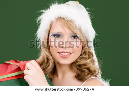 picture of happy santa helper with gift box