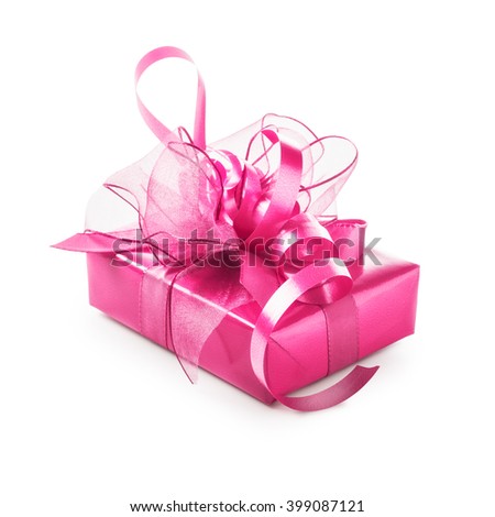 Pink gift box with ribbon bow. Luxury holiday present. Object isolated on white background clipping path included