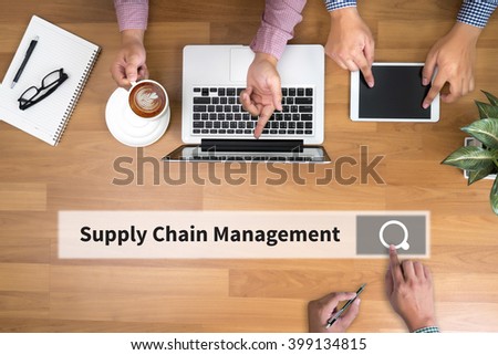 SCM Supply Chain Management concept man touch bar search and Two Businessman working at office desk and using a digital touch screen tablet and use computer objects on the right, top view