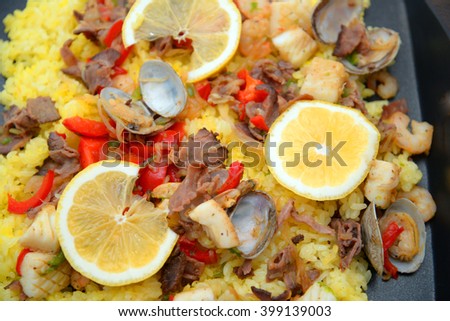Delicious handmade paella on a  white background