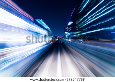 Speed motion in urban highway road tunnel Royalty-Free Stock Photo #399247789