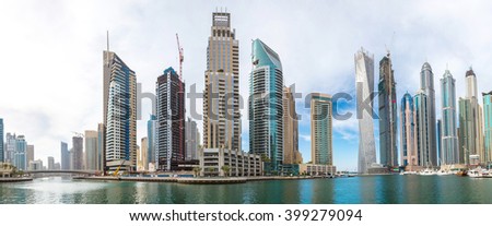 Panorama of Dubai Marina in a summer day, UAE Royalty-Free Stock Photo #399279094