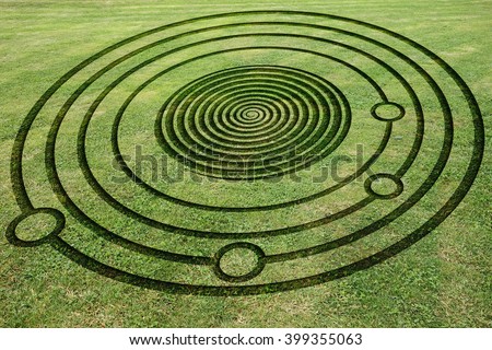 Concentric circles and spiral to make a fake crop circle in the meadow                         