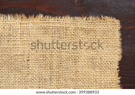 The texture of jute canvas on a wooden table