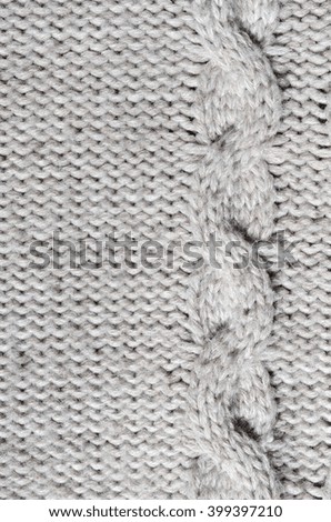  The texture of gray knitted fabric with decorations