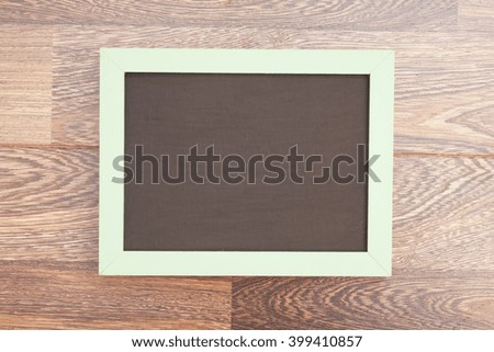 school wooden blank blackboard on wooden background