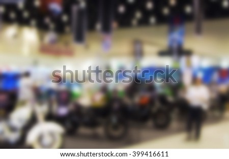 blurred image of motor show,show room,motor expo for background