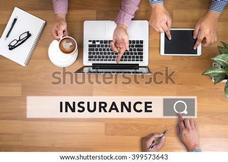 INSURANCE CONCEPT  man touch bar search and Two Businessman working at office desk and using a digital touch screen tablet and use computer objects on the right, top view