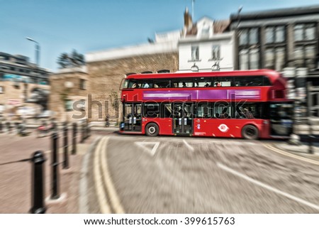 Blurred view of fast moving Double Decker Bus, London.