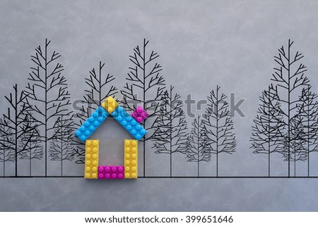 house model with drawing of tree