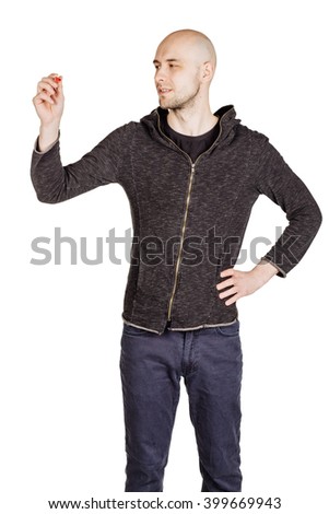 Happy smiling young man with bald head writing something with a marker. human emotion expression and lifestyle concept. image on a white studio background.