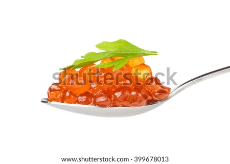 Spoon of red caviar isolated on white
