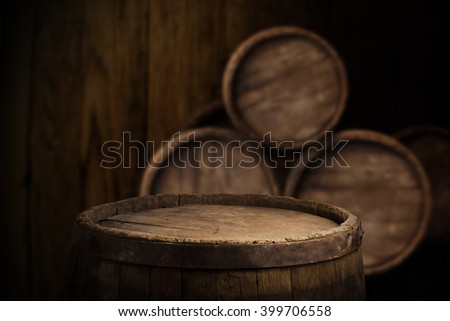 background of barrel and worn old table of wood Royalty-Free Stock Photo #399706558
