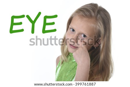 6 or 7 years old little girl with blond hair and blue eyes smiling happy posing isolated on white background pointing eye  in learning English language school education body parts card set
