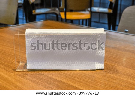 tissue paper on the wood table Royalty-Free Stock Photo #399776719