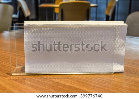 tissue paper on the wood table Royalty-Free Stock Photo #399776740