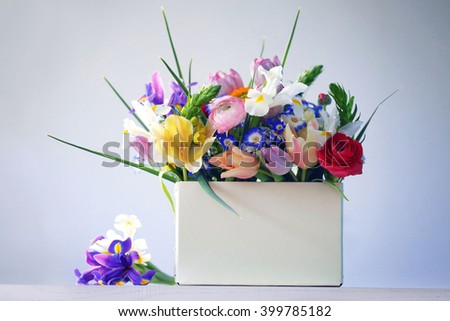 A bouquet of fresh flowers in a box, close up
