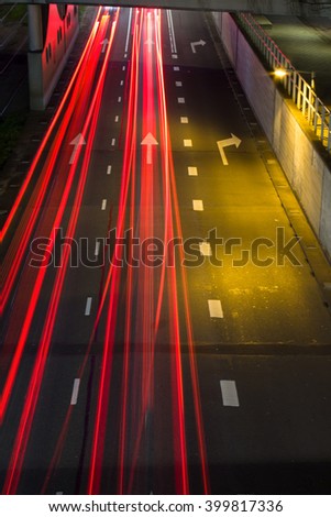 Light trails and motion blur from car traffic on highway