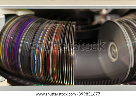 Old CD Changer Carousel Mega Storage. Some Dust and dirt on CDs. Selective focus