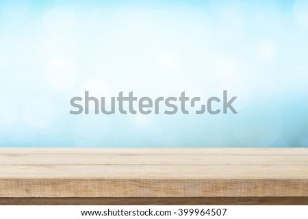 Wood table top on blur nature background