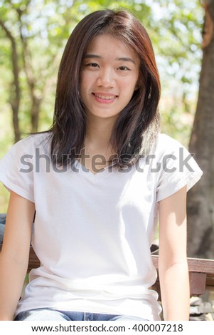 asia thai teenager Women White T-Shirt Writing relax and smile