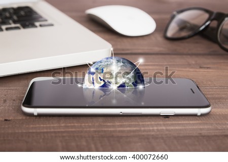 earth on phone screen network concept elements of this image furnished by nasa