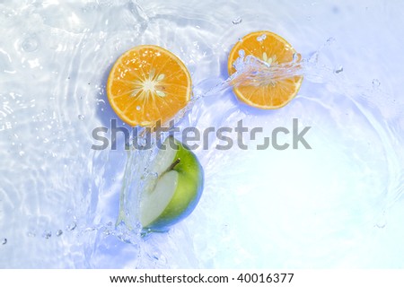 Fruit with splashing water