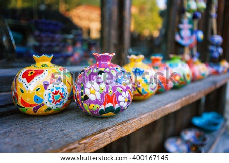 clayware souvenirs sold on a local market in the old town of Sheki, Azerbaijan on Karavan Saray street Royalty-Free Stock Photo #400167145