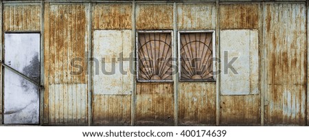 old metal warehouse door and wall