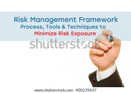 Businessman hand writing Risk Management Framework. Process, Tools & Techniques to Minimize Risk Exposure. Risk Management concept.
