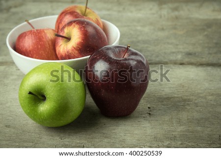 Three varieties of apples on white background.