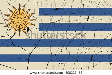 Uruguay old flag with fracture. Grunge effect can be cleaned easily.