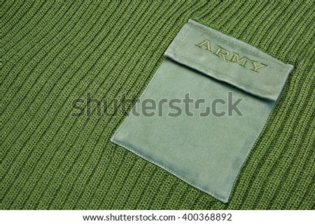 Green Khaki Military Uniform Male Sweater With Embroidered Sign Army On The Chest Pocket, Top View, Close Up