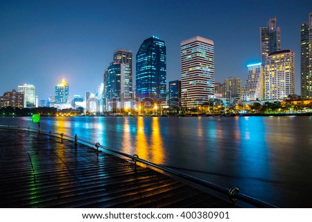 modern night cityscape in Benchakitti Park thailand