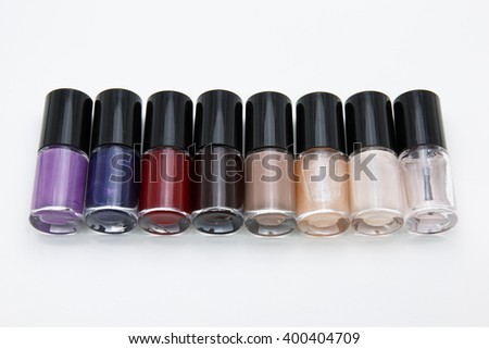 variety color of nail polish on white background