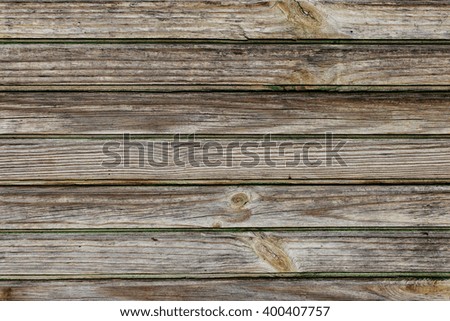 Gray wooden textured background closeup. Natural background. Wooden background of gray boards