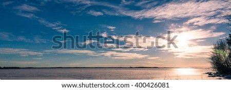 Blue sky under the lake in winter