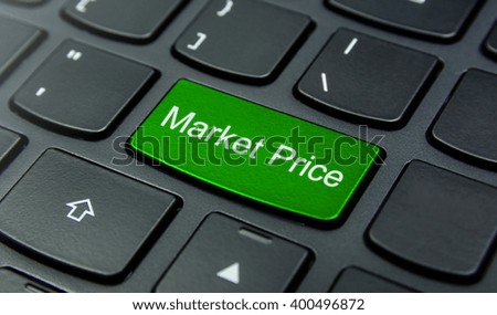 Business Concept: Close-up the Market Price button on the keyboard and have Lime, Green color button isolate black keyboard