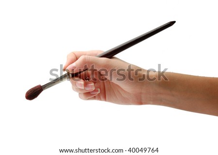 Hand with brush
