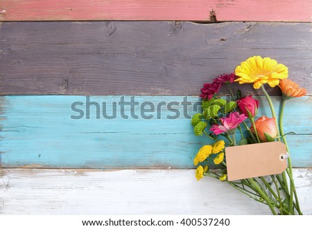 Flowers on wood background