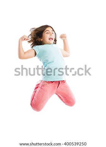 Beautiful and happy young girl jumping 
