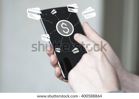 Businessman pressing button dollar online credit card phone
