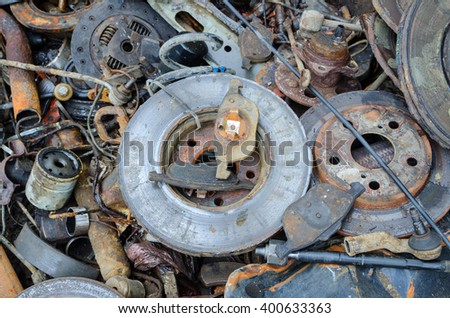 Useless, worn out rusty brake discs shock absorber and other parts