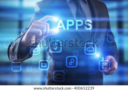 Businessman pressing APPS icon on virtual screen .