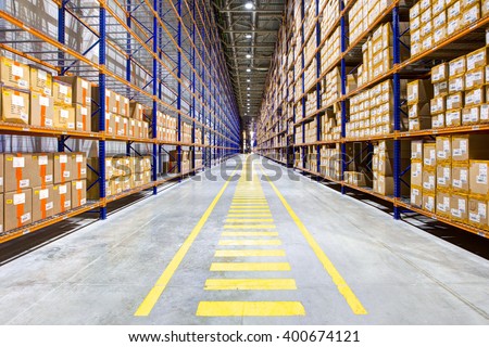Rows of shelves with boxes  Royalty-Free Stock Photo #400674121