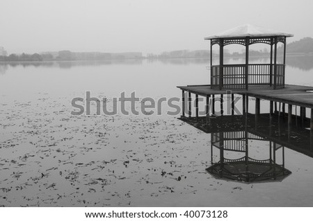 Lake in a foggy day
