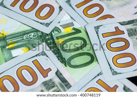 100 dollar and 100 euro banknotes