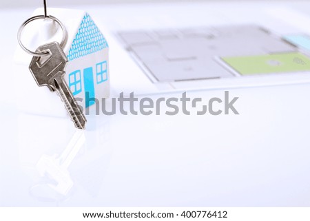 The small  house with a key.  The plan of a flat behind