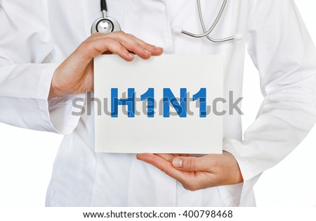 H1N1 card in hands of Medical Doctor Royalty-Free Stock Photo #400798468